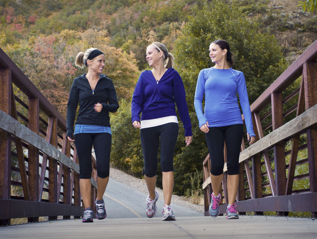 Walking - The Simple Path to Feeling Sexier and Living Longer. Women walking on a path together to get exercise