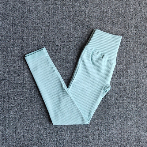 Excellent Material - This yoga workout set for women is made of nylon and spandex. The fabric is thick and is non see through. Lightweight, comfortable, stretchy, flattering and compressive, totally squat proof. Seamless microfiber technology is moisture wicking, quick drying abilities to keep you cool and dry during any workout. Fashion Design: This yoga set has the ribbed texture design. The high waist compression athletic seamless leggings are perfect for tummy control.