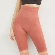  Slim your waist and tone your glutes with our High Waist Yoga Shorts. Light compression fabric gently hugs your waistline and tucks tummies in. The fabric pushes up your glutes for a more natural look that contours to every curve wonderfully. You’ll be feeling your most confident self when wearing the High Waist Yoga Shorts and that’s a promise we stand by.